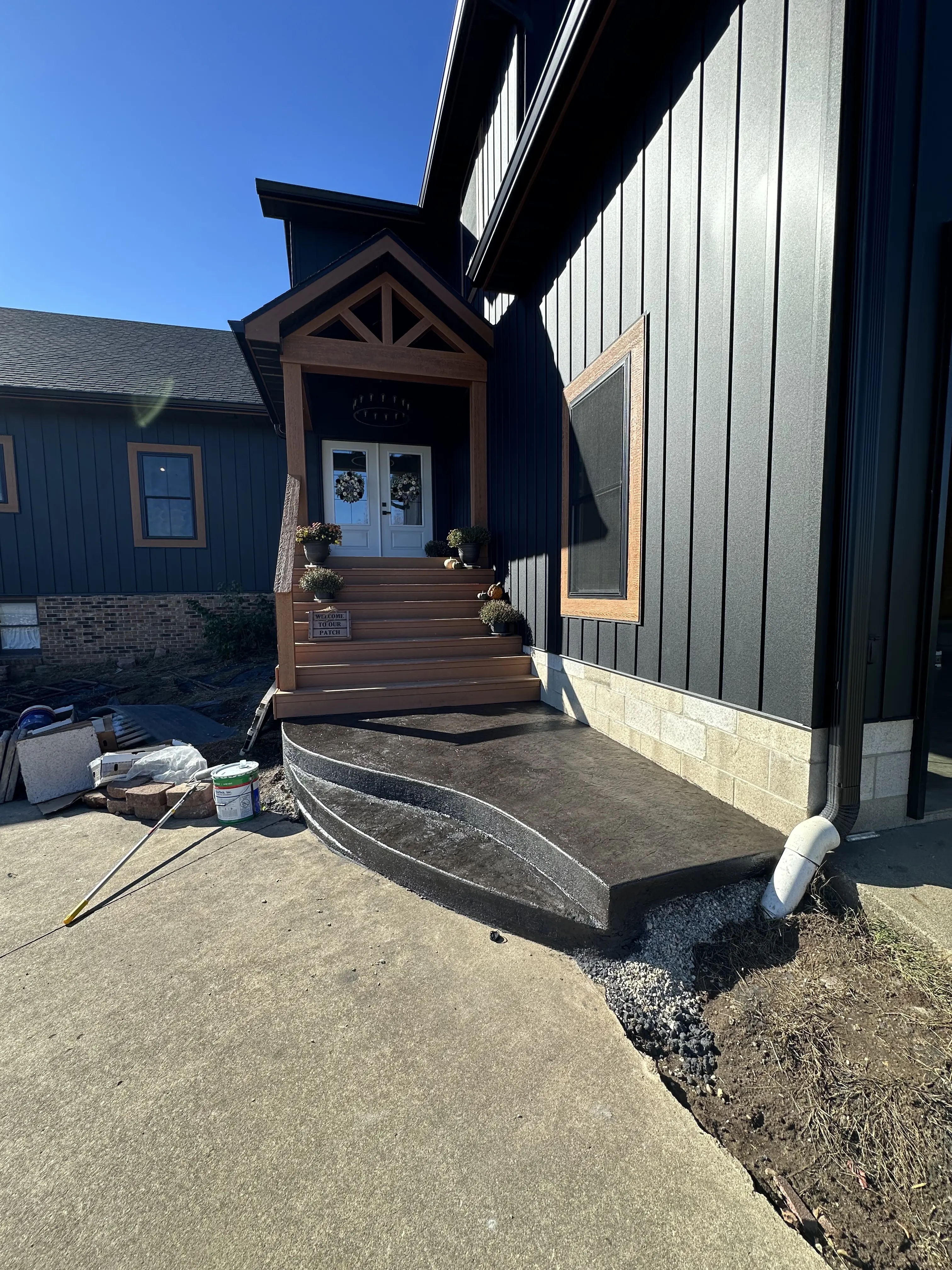 Decorative stamped entry with curved steps